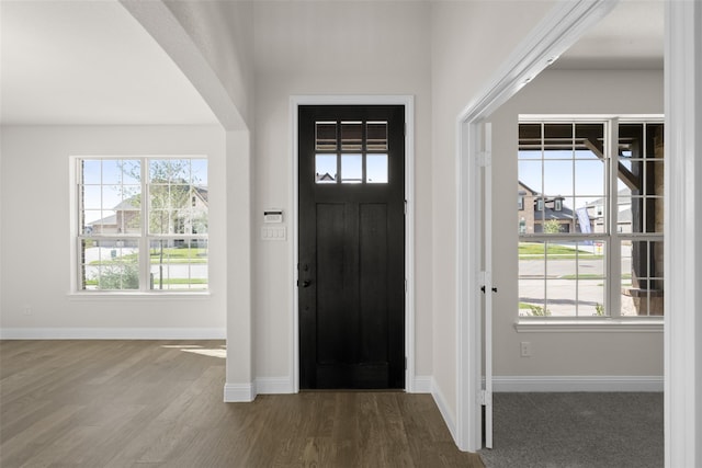 entryway with hardwood / wood-style flooring