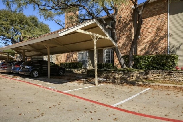 view of parking with a carport