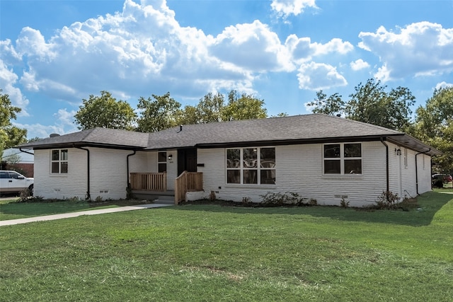 ranch-style house with a front yard