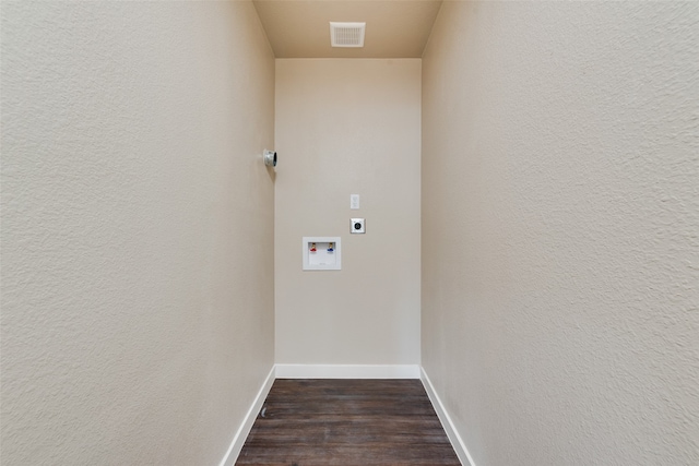 laundry area featuring hookup for a washing machine, dark hardwood / wood-style floors, and electric dryer hookup