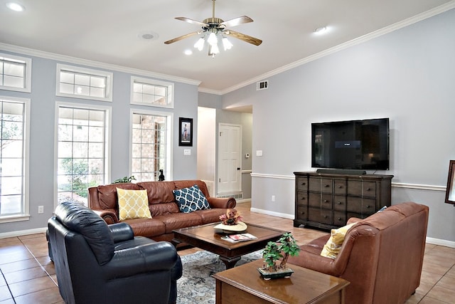 living room with ceiling fan, light tile patterned floors, and ornamental molding