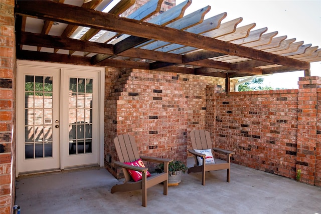 view of patio / terrace with a pergola and french doors