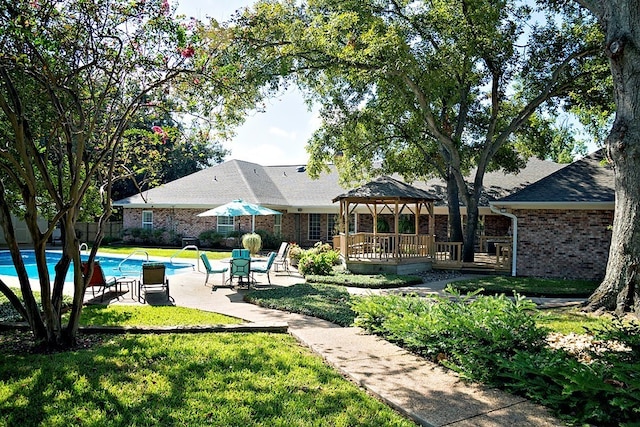 view of yard with a patio and a gazebo