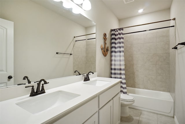 full bathroom with shower / tub combo with curtain, vanity, toilet, and tile patterned flooring