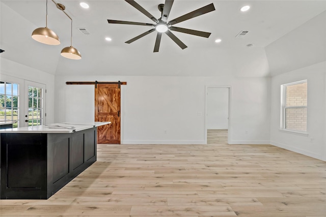 306 Sunset, Roxton, TX 75477 - unfurnished living room with a barn door, high vaulted ceiling, light wood-type flooring, baseboards, and ceiling fan