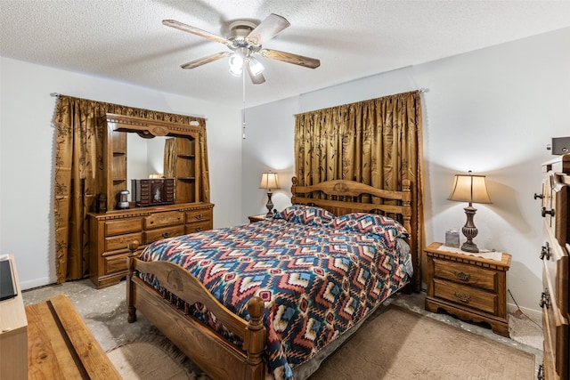 bedroom featuring a textured ceiling, ceiling fan, and light colored carpet