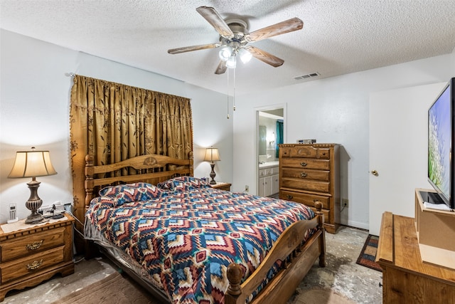 bedroom featuring a textured ceiling, connected bathroom, and ceiling fan