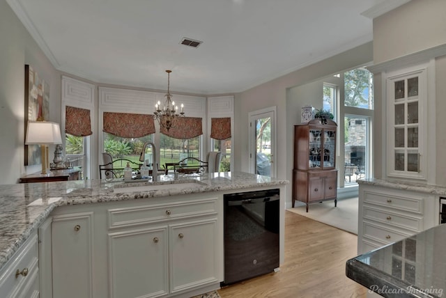 kitchen featuring white cabinets, kitchen peninsula, a high ceiling, light carpet, and light stone countertops