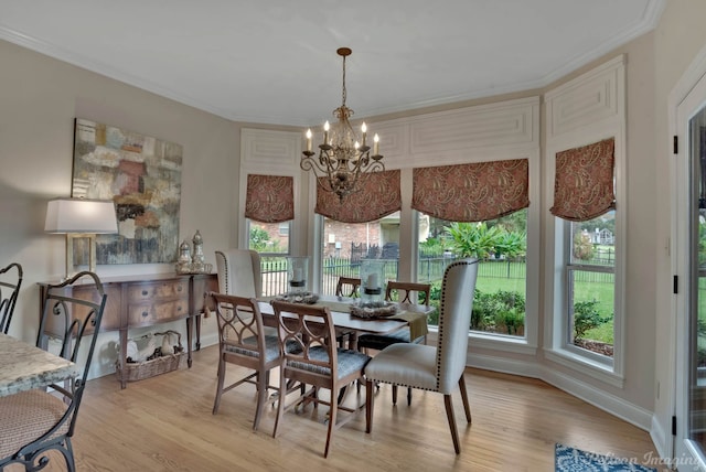 kitchen featuring white cabinets, a center island with sink, sink, and black appliances