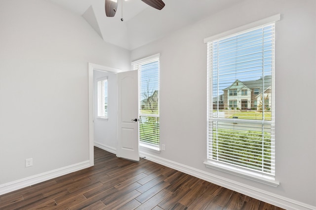 empty room featuring ceiling fan and dark hardwood / wood-style flooring