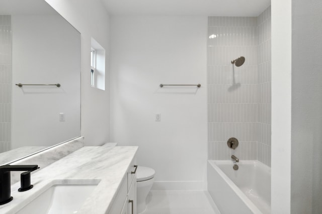 full bathroom featuring tile patterned flooring, tiled shower / bath combo, vanity, and toilet