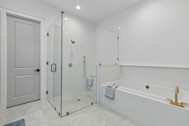 bathroom with independent shower and bath