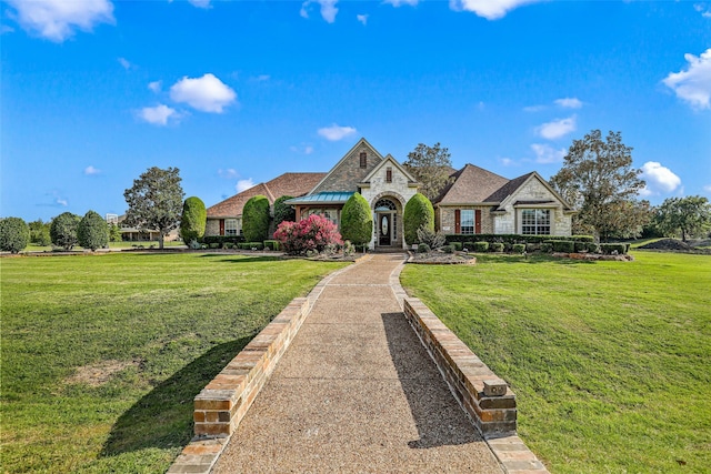 view of front of home with a front lawn