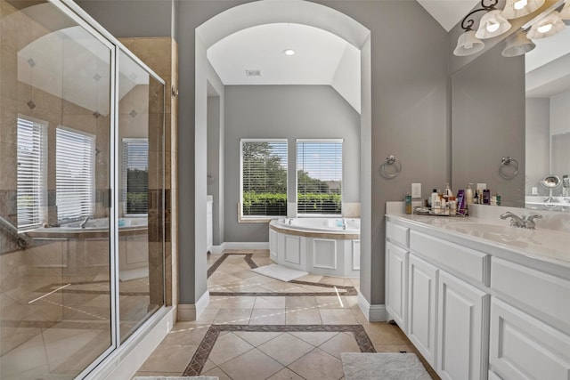 bathroom with vanity and independent shower and bath