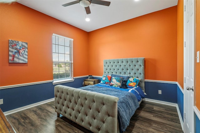 bedroom featuring ceiling fan and dark hardwood / wood-style flooring