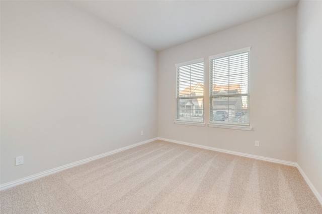 empty room with carpet flooring