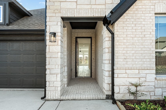 property entrance with a garage