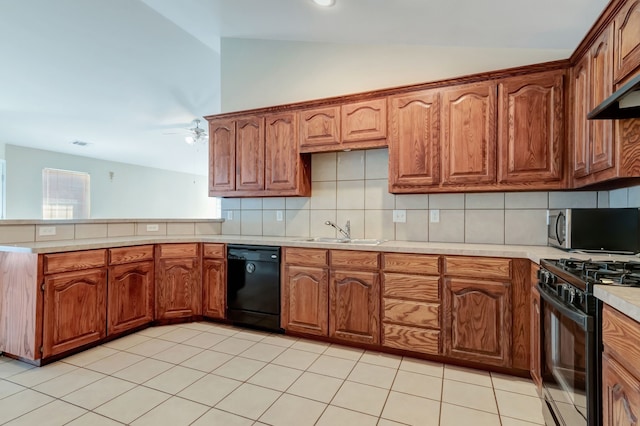 kitchen featuring tasteful backsplash, vaulted ceiling, ceiling fan, sink, and black appliances