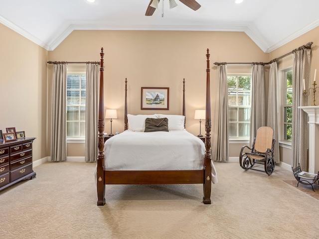 bedroom with light carpet, vaulted ceiling, ceiling fan, and ornamental molding