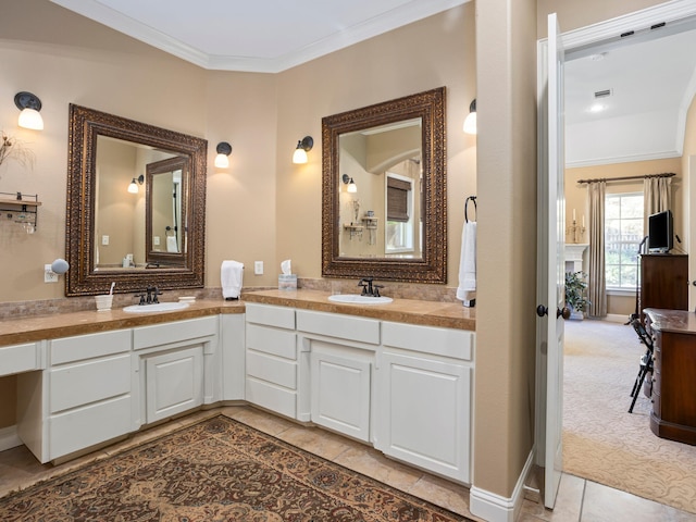 7005 Shinnecock Hills Dr, Fort Worth, TX 76132 - bathroom with double vanity, ornamental molding, and a sink