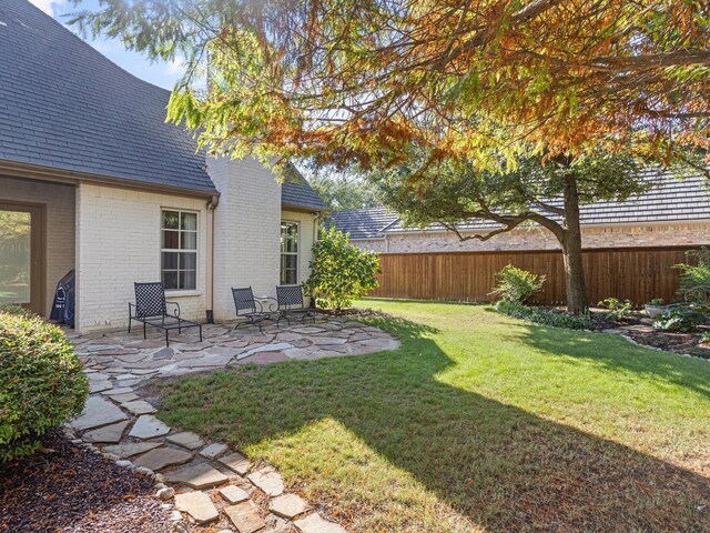 view of yard with a patio area