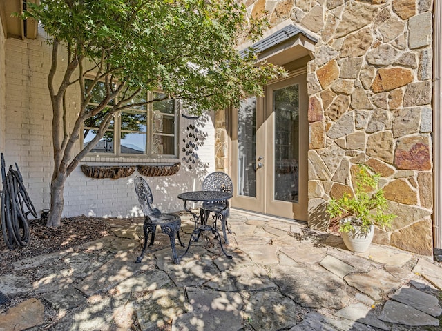 view of patio featuring french doors