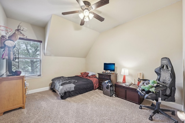 carpeted bedroom featuring vaulted ceiling and ceiling fan