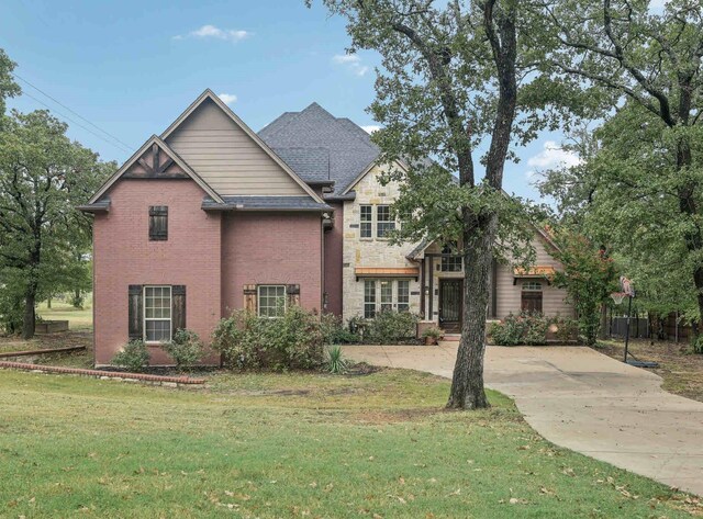 view of front of home with a front yard