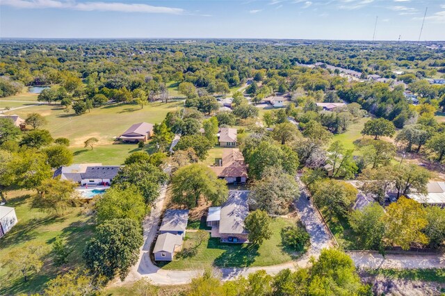 ranch-style home featuring a front lawn