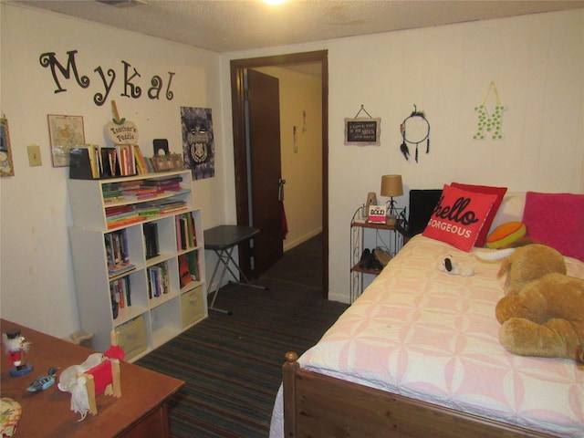 bedroom with a textured ceiling