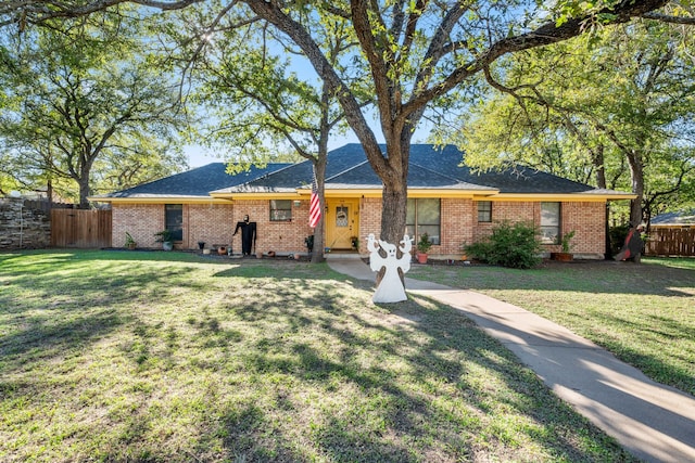 ranch-style house with a front yard