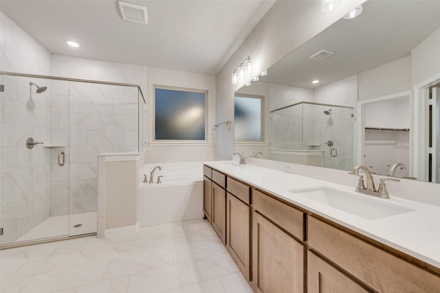 bathroom featuring vanity and plus walk in shower