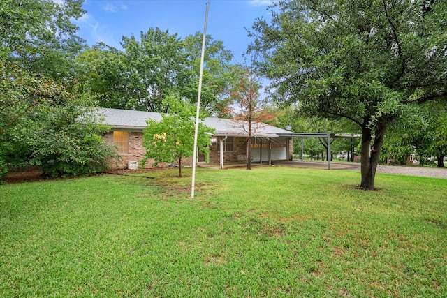 view of yard featuring a carport