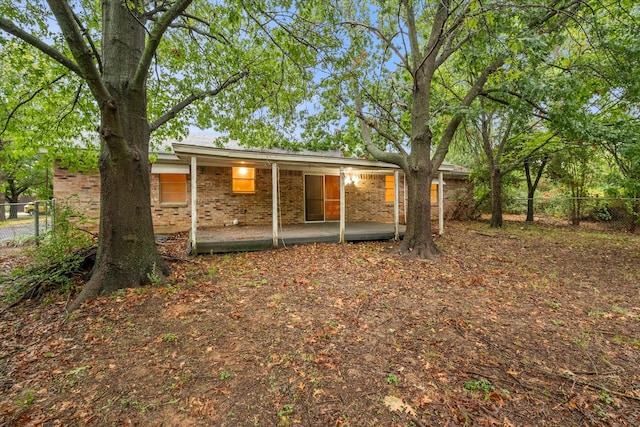 back of house with a patio area