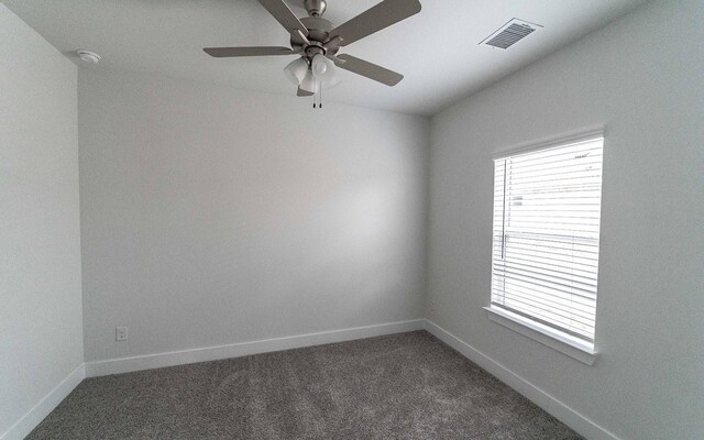 spare room with ceiling fan and hardwood / wood-style flooring