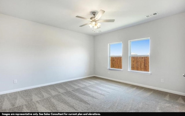 empty room with light carpet and ceiling fan