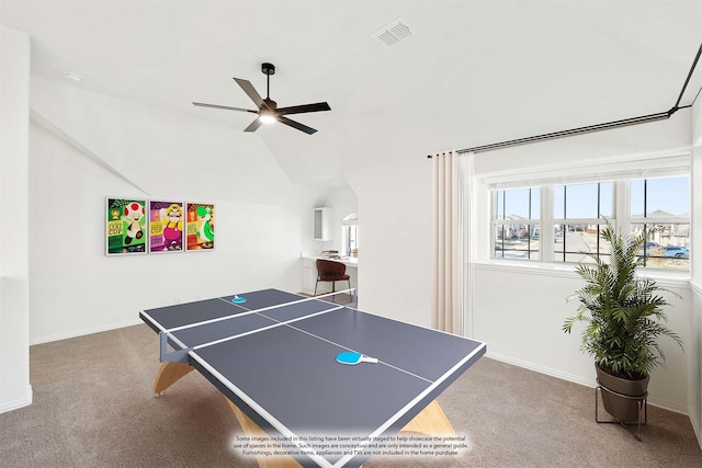 game room featuring carpet flooring, ceiling fan, and lofted ceiling