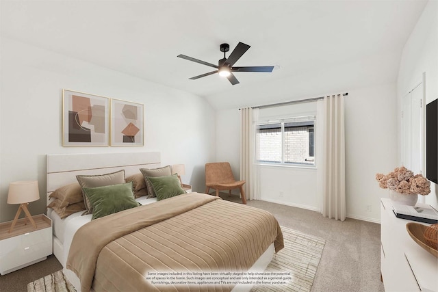 bedroom with ceiling fan, light carpet, and vaulted ceiling