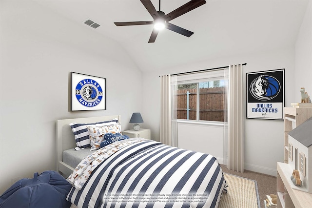 carpeted bedroom with lofted ceiling and ceiling fan