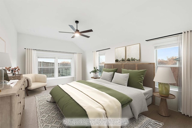 carpeted bedroom with ceiling fan and vaulted ceiling