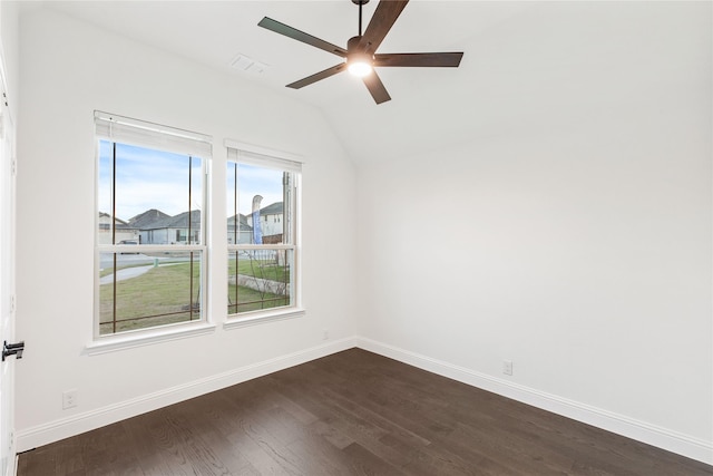 empty room with ceiling fan, lofted ceiling, and dark hardwood / wood-style floors