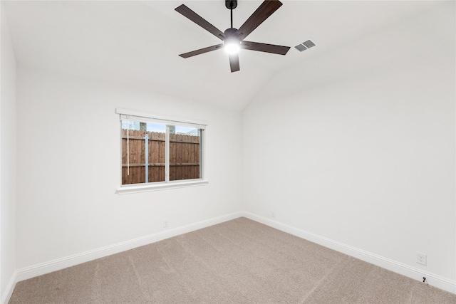 unfurnished room featuring lofted ceiling, carpet floors, and ceiling fan