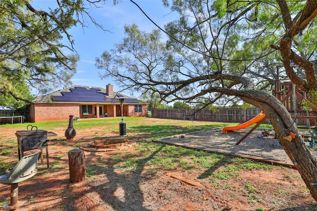 view of yard featuring a playground