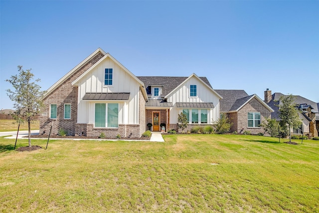 view of front of house with a front lawn