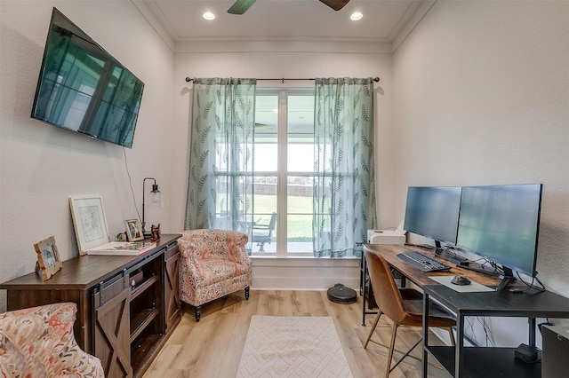 office area with wood finished floors, ceiling fan, and ornamental molding