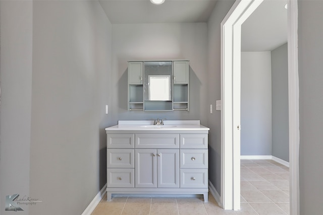 bathroom featuring tile patterned floors and vanity