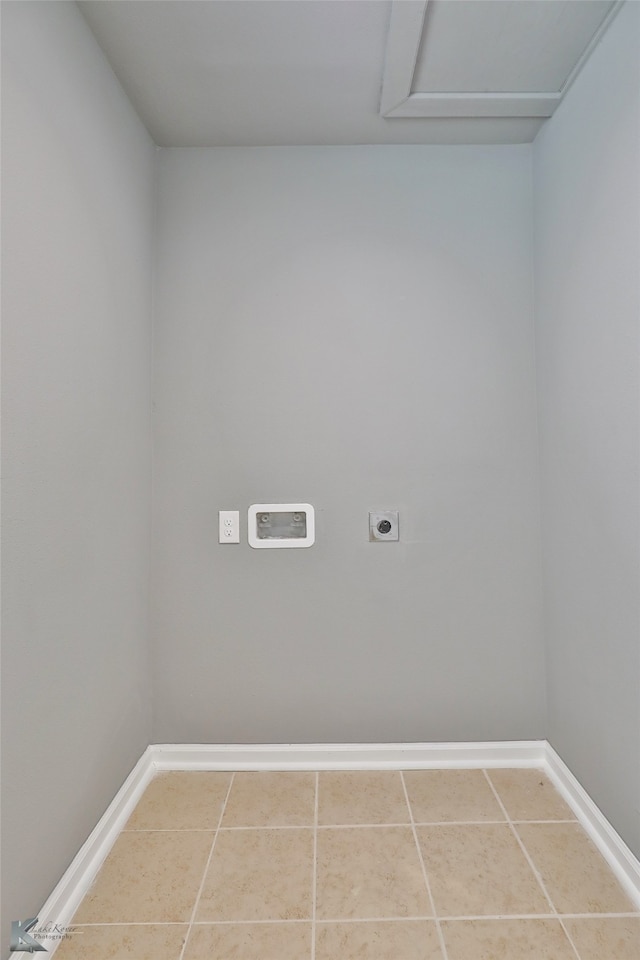 washroom featuring washer hookup, electric dryer hookup, and tile patterned floors