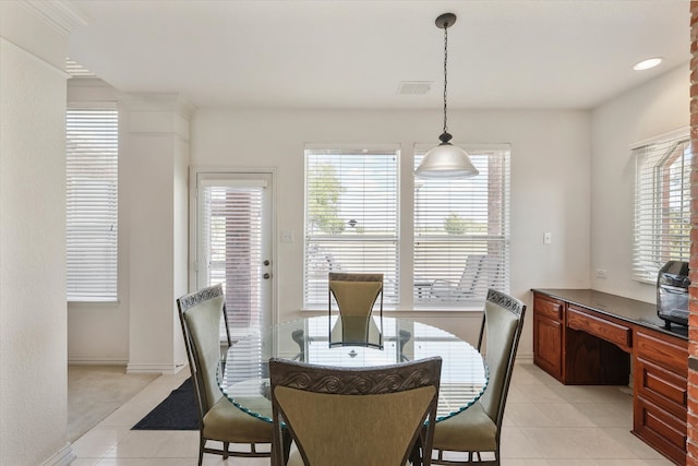 dining room featuring light tile patterned floors