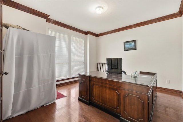 home office featuring a healthy amount of sunlight, ornamental molding, and dark hardwood / wood-style flooring