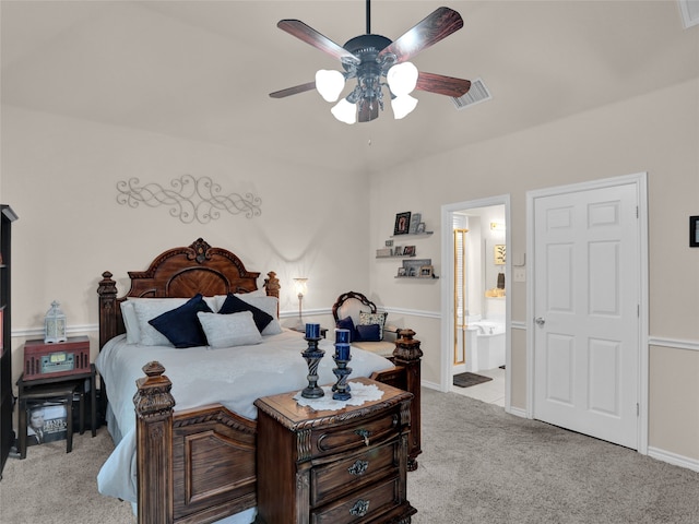 carpeted bedroom featuring ceiling fan and connected bathroom